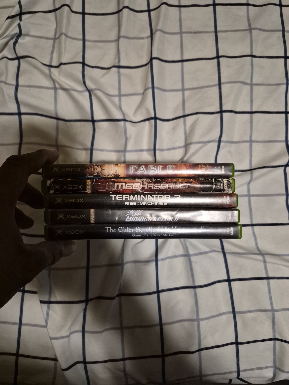 Microsoft Xbox Game Stack with Green Case Accents